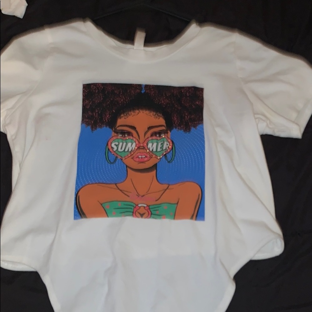 A white shirt with a picture on it.